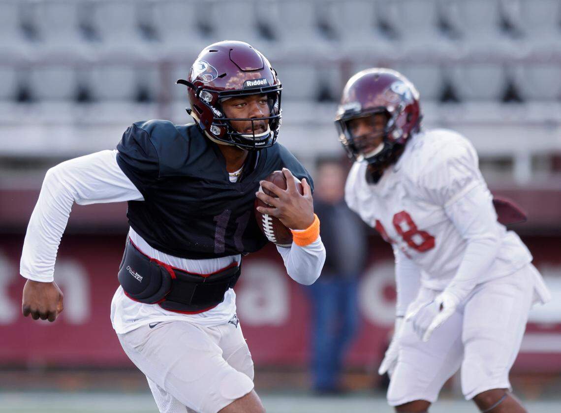 North Carolina Central quarterback Davius Richard runs the ball during practice at O’Kelly-Riddick Stadium on Tuesday, Oct. 18, 2022, in Durham, N.C.