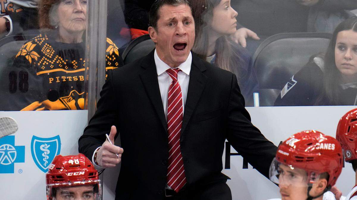 Carolina Hurricanes head coach Rod Brind’Amour makes his point to a referee during the third period of an NHL hockey game against the Pittsburgh Penguins in Pittsburgh, Thursday, Dec. 22, 2022. The Hurricanes won in overtime 4-3. (AP Photo/Gene J. Puskar)