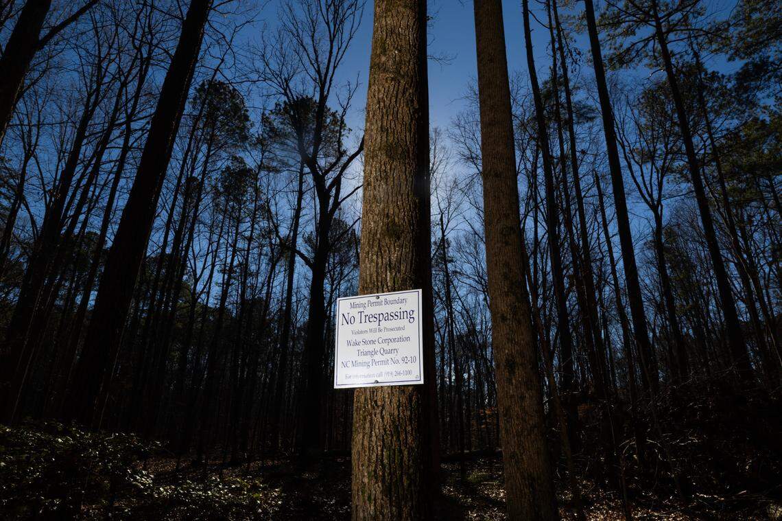 A sign along the boundary between William B. Umstead State Park and land owned by Raleigh-Durham International Airport. Wake Stone Corp. has a mineral lease on the RDU land and plans to build a stone quarry there.