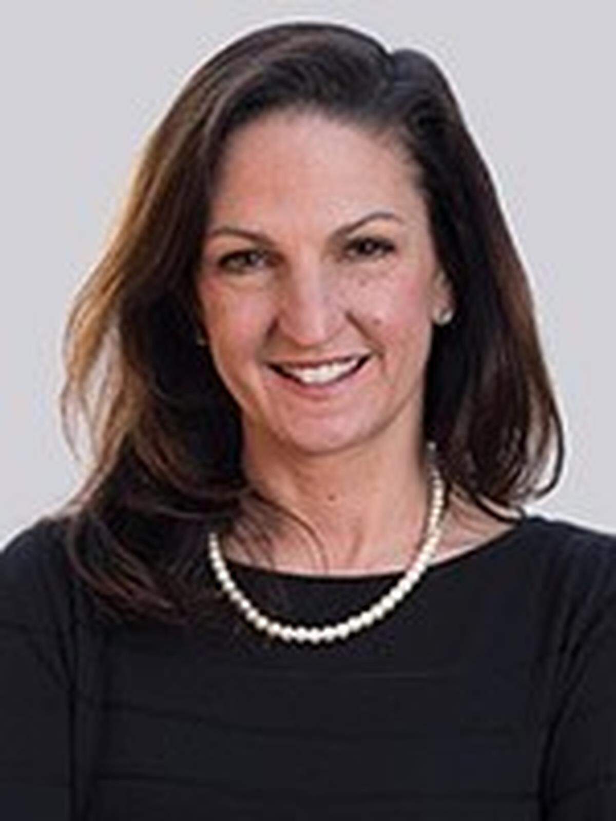 N.C. State women’s cross-country coach Laurie Henes led the Wolfpack to a national title in 2021.