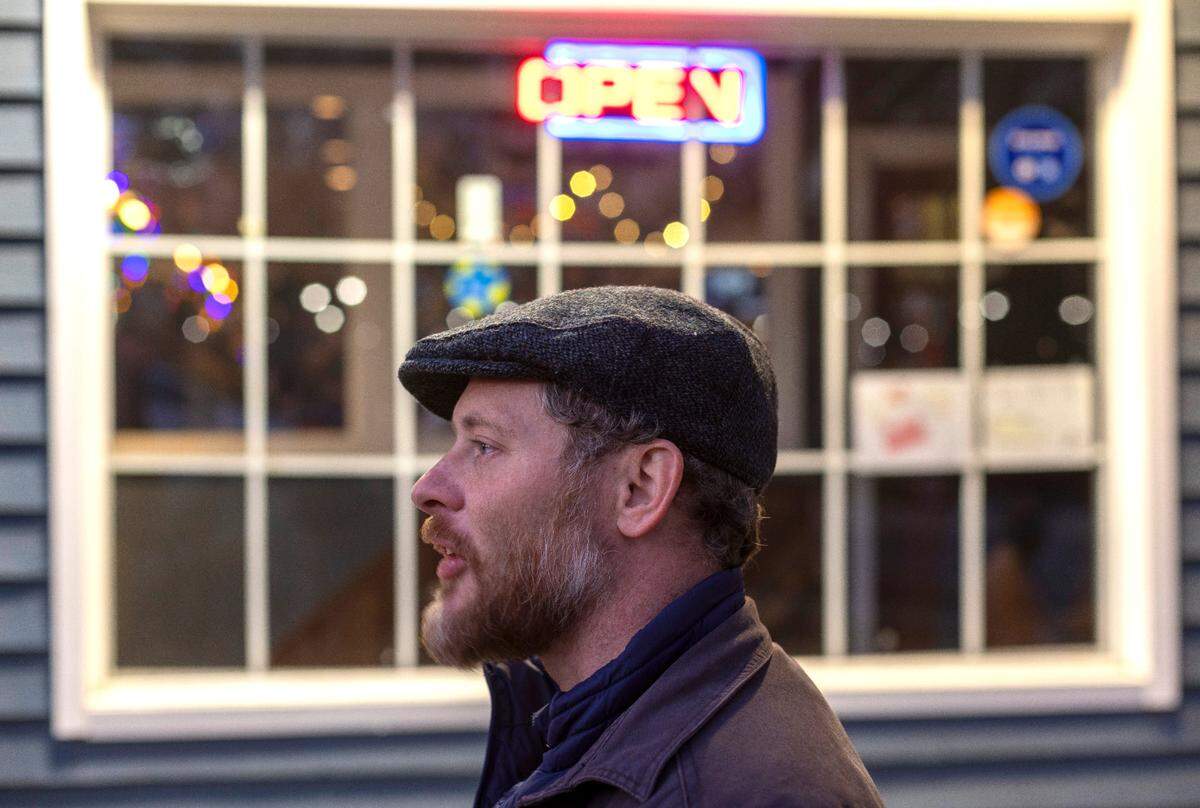 Linda’s Bar & Grill owner Christopher Carini in front of his bar on Franklin Street on Thursday, January 4, 2024 in Chapel Hill, N.C.