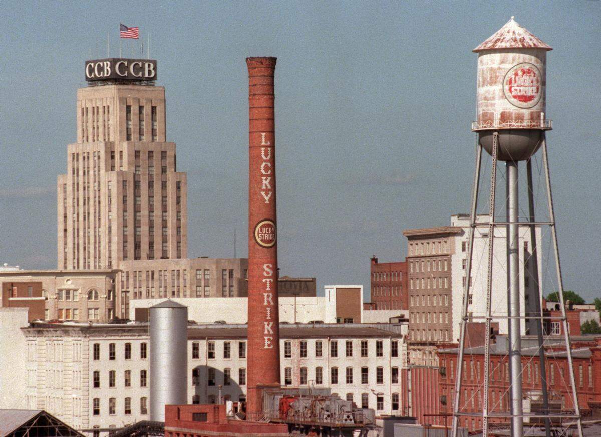 The American Tobacco complex’s Lucky Strike smokestack and the Durhams skyline, photographed in 2000.