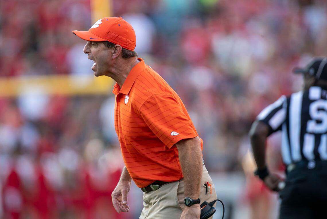 Clemson coach Dabo Swinney yells at the officials after a penalty call against the Tigers in the third quarter against N.C. State on Saturday September 25, 2021 at Carter-Finley Stadium in Raleigh, N.C.