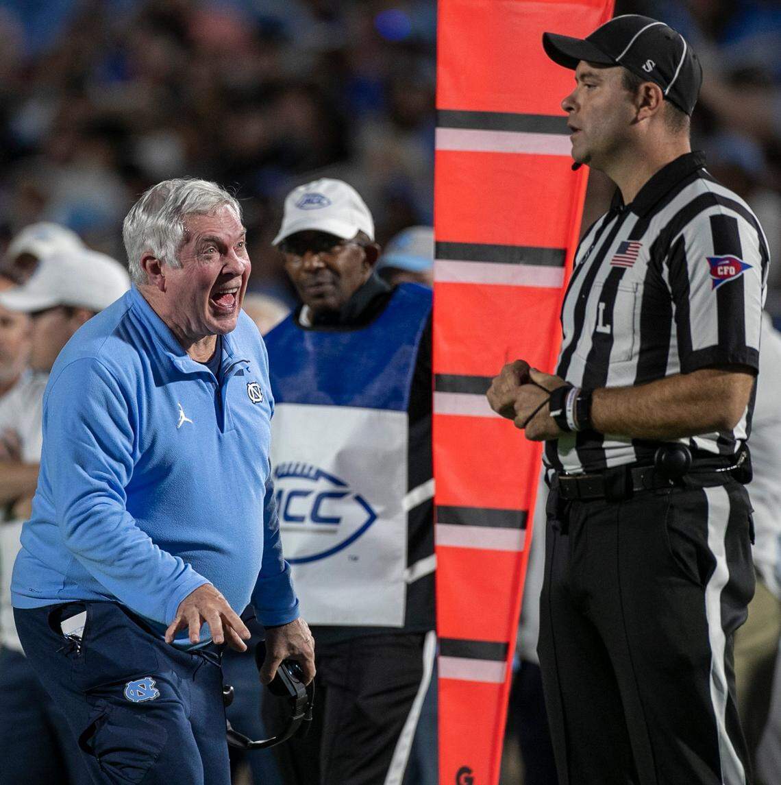 North Carolina coach Mack Brown argues with official Brian Perry after a penalty against the Tar Heels in the first quarter against Duke on Saturday, October 15, 2022 at Wallace-Wade Stadium in Durham, N.C.
