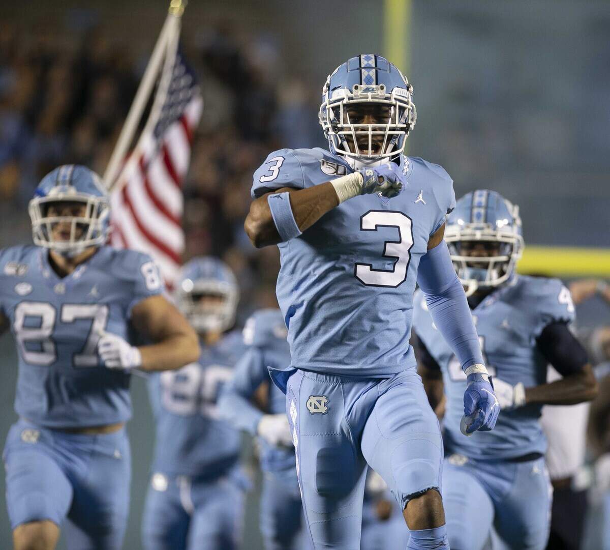 North Carolina Dominique Ross (3) and his teammates enter Kenan Stadium for their game against Virginia on Saturday, November 2, 2019 at Kenan Stadium in Chapel Hill, N.C.