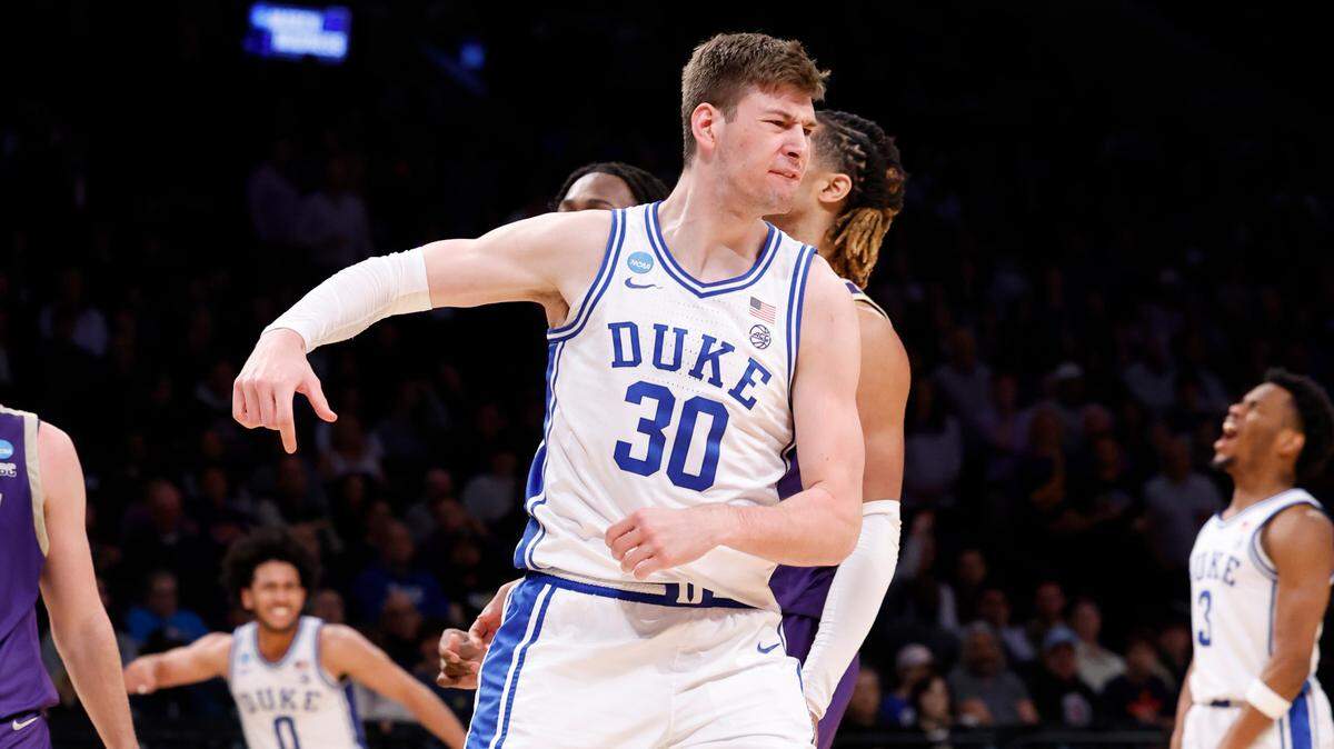 Duke’s Kyle Filipowski (30) celebrates after making the basket while being fouled during the second half of Duke’s 93-55 victory over James Madison in the second round of the NCAA Tournament at the Barclays Center in Brooklyn, N.Y., Sunday, March 24, 2024.