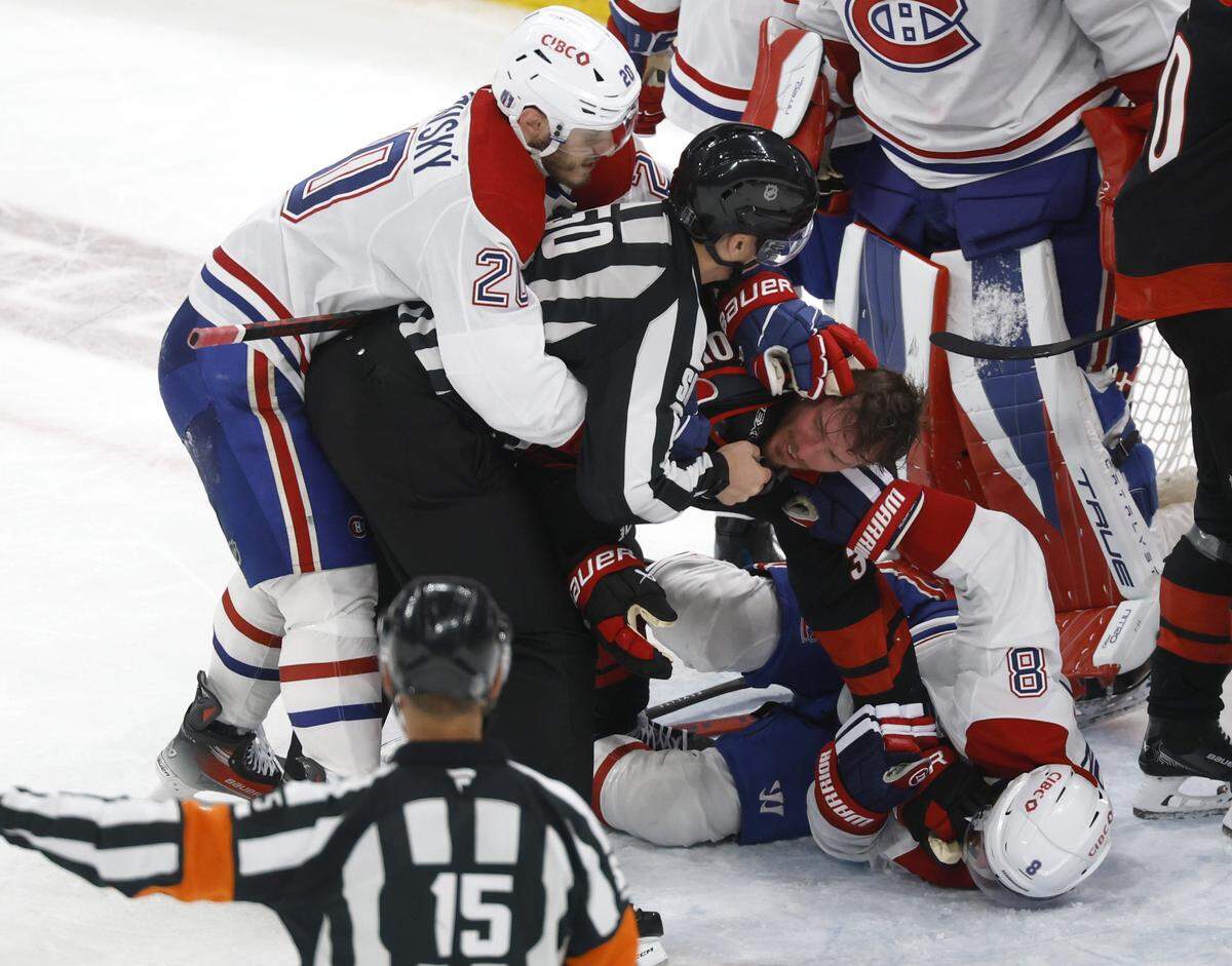Carolina's Andrei Svechnikov (37) tangles with Montréal's Mike Matheson (8) during the second period of the Hurricanes’ game against the Canadiens in game one of the Eastern Conference Finals at the Lenovo Center Thursday, May, 21, 2026.