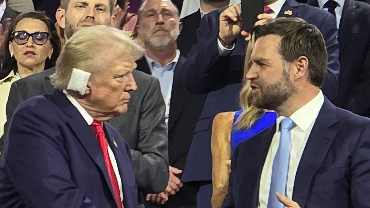 Former President Donald Trump and his running mate, Sen. JD Vance, shake hands at the Republican National Convention in Milwaukee, Wisconsin on Tuesday, July 16, 2024.