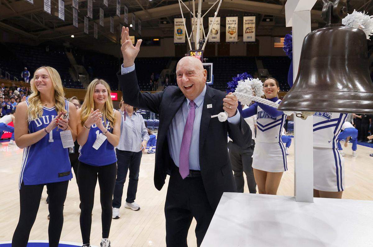 ESPN college basketball analyst Dick Vitale rings the bell at half court to mark the end of cancer treatment before Duke’s game against Stanford at Cameron Indoor Stadium in Durham, N.C., Saturday, Feb. 15, 2025.