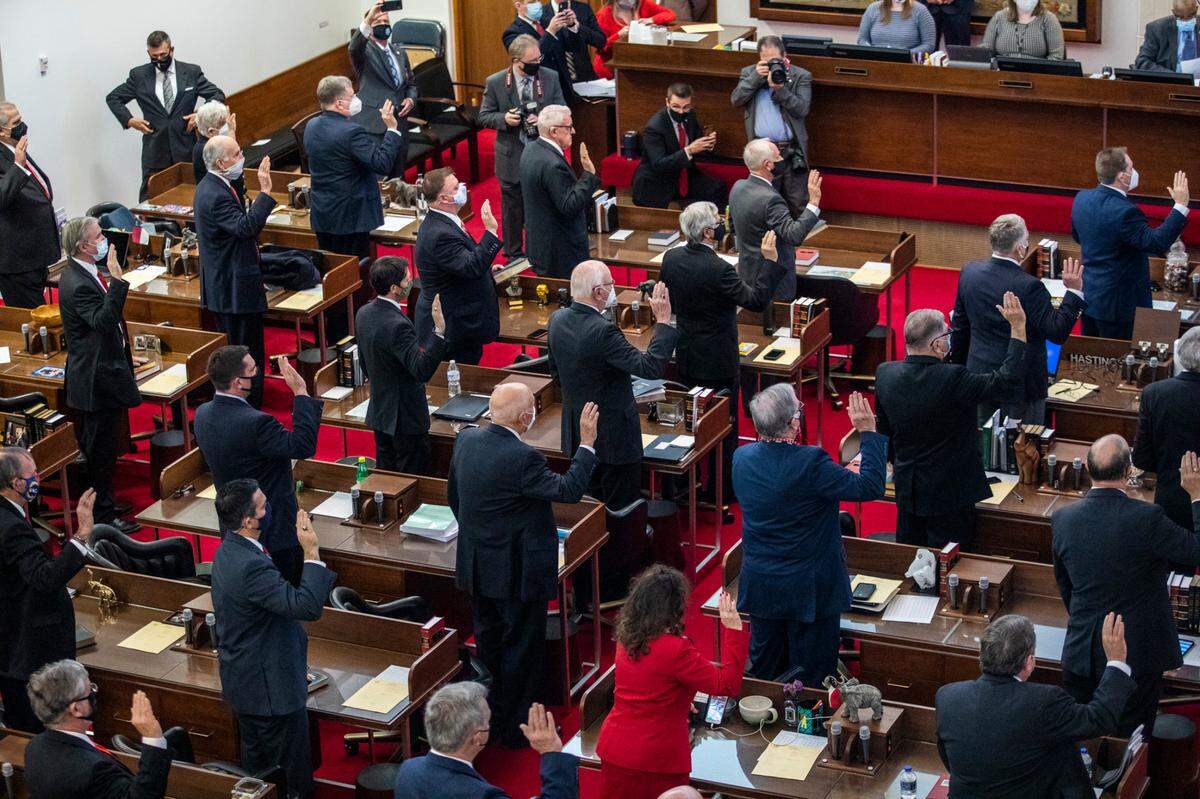 In this file photo, members of the N.C. House of Representatives take the oath of office in the House chamber Wednesday Jan. 13, 2021, at the North Carolina General Assembly.