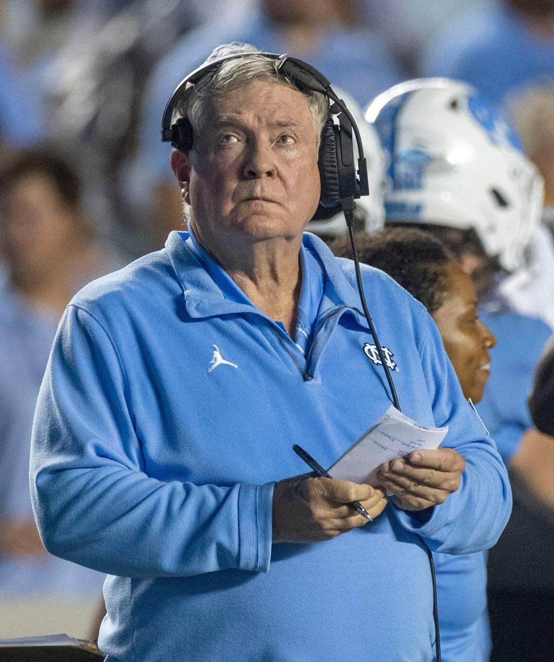 North Carolina coach Mack Brown checks the replay after a touchdown in the second quarter against Florida A&M on Saturday, August 27, 2022 at Kenan Stadium in Chapel Hill, N.C.