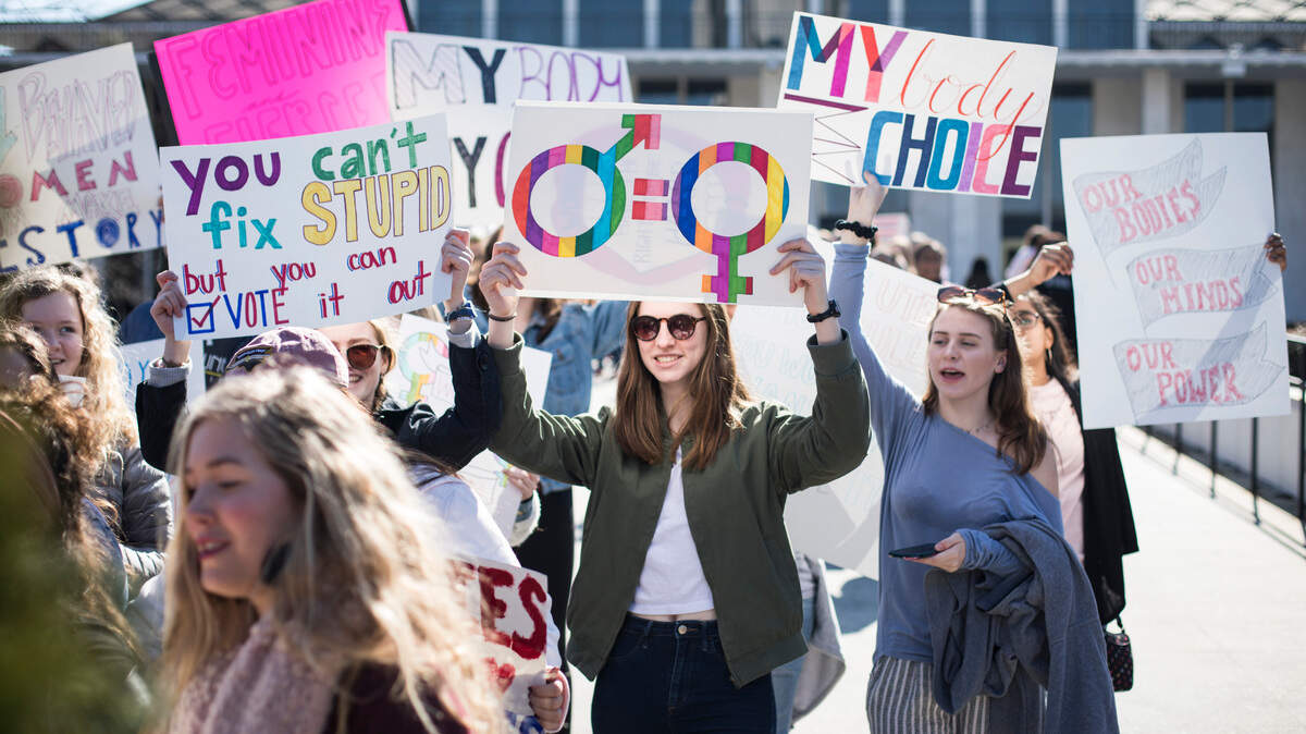 Women’s March on Raleigh participants cross the bridge connecting the NC legislative building to Halifax Mall on Jan. 26. More women are serving in elected office, including a record 102 in the U.S House. NC state lawmakers will urge more women to run for office during a Facebook event at 4:30 p.m. Wednesday.