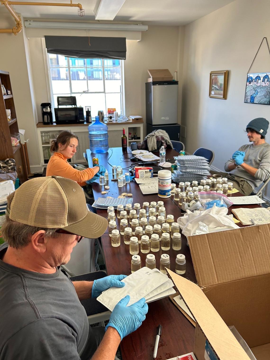 The number of well water samples after Tropical Storm Helene hit Western North Carolina is lagging behind where health officials anticipated it would. Here, staff members from environmental nonprofit MountainTrue prepare to test samples they passed out for coliform bacteria.