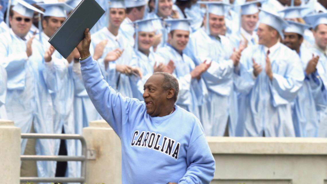 Bill Cosby leaves the field after delivering the commencement address at UNC's 2003 Commencement exercises at Kenan Stadium.