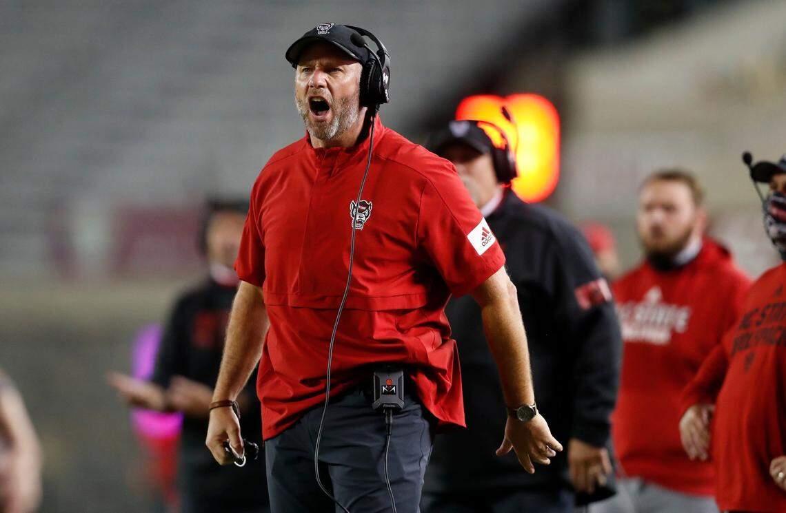 N.C. State head coach Dave Doeren argues the call during the first half of N.C. State’s game against Virginia Tech at Lane Stadium in Blacksburg, VA Saturday, Sept. 26, 2020.