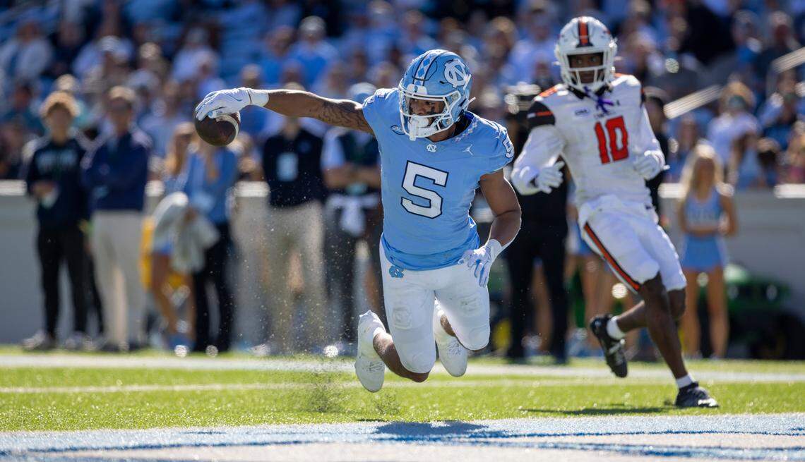 North Carolina’s Jahvaree Ritzie (5) tries unsuccessfully to down a punt by Drake Maye at the goal line in the second quarter against Campbell on Saturday, November 4. 2023 at Kenan Stadium in Chapel Hill, N.C.
