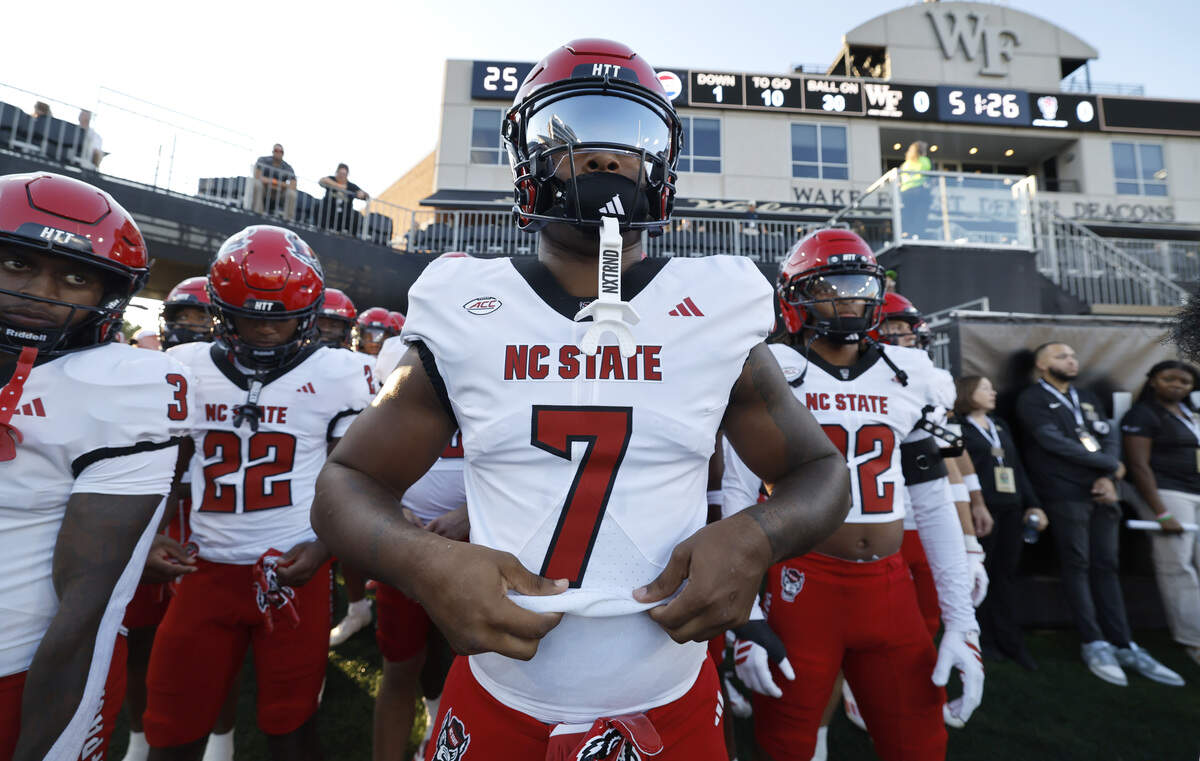 N.C. State tight end Justin Joly (7) gets ready to head out onto the field to warmup before N.C. State’s game against Wake Forest at Allegacy Stadium in Winston-Salem, N.C., Thursday, Sept. 11, 2025.