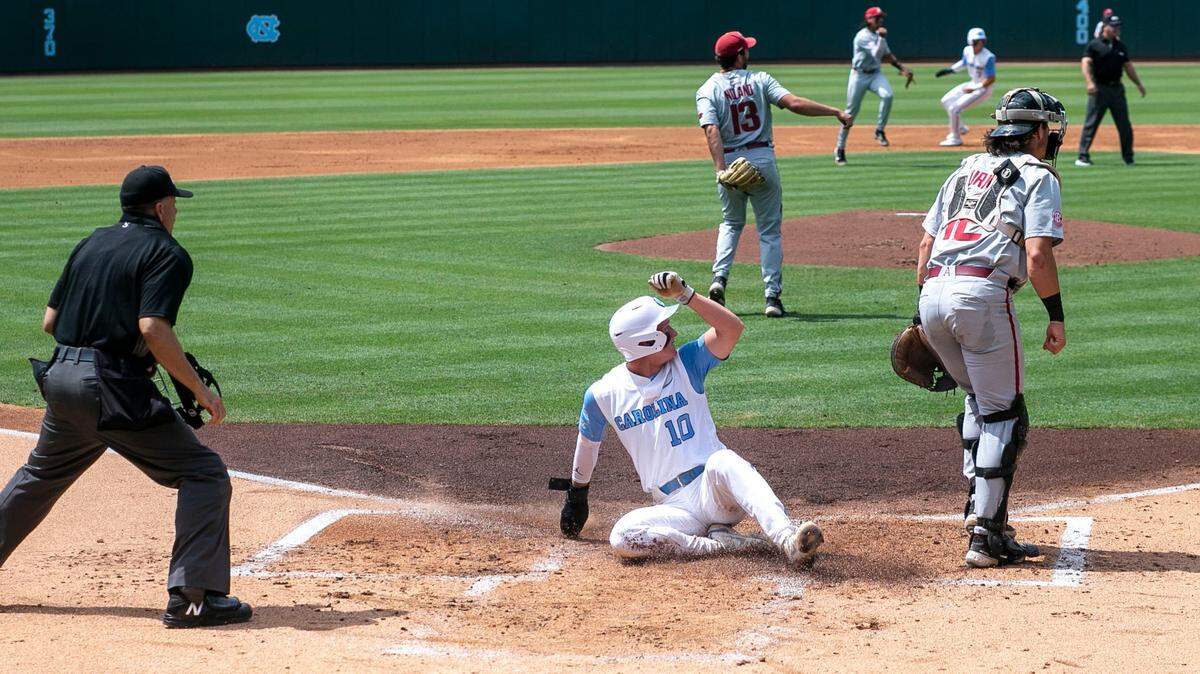 North Carolinas Mac Horvath (10) slides into home during the first game of their Super Regional series at Boshamer Stadium in Chapel Hill, N.C., in 2022. Horvath hit a big home run for the Tar Heels Saturday against Wright State to lead UNC to a season-saving win.
