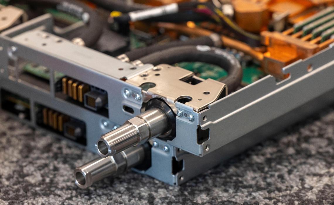 The intake valve on a Lenovo server, where cooled water enters, and circulates to reduce heat and improve computing efficiency.