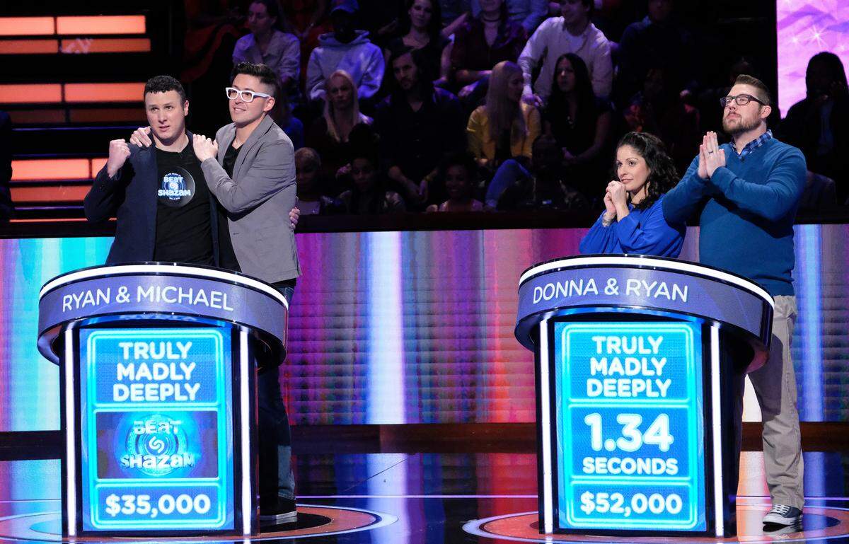 From left: Contestants Ryan, Michael, Donna and Ryan in "Beat Shazam" on Fox.
