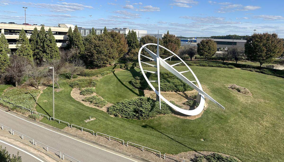 The Triangle Icon sculpture seen from the parking deck at Raleigh-Durham International Airport. The monument honors Wilbur and Orville Wright and was dedicated on Dec. 17, 2003, the centennial of their first powered flight at Kitty Hawk.