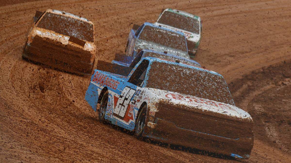 BRISTOL, TENNESSEE - MARCH 27: Chase Purdy, driver of the #23 BamaBuggies.com Chevrolet, drives during qualifying for the NASCAR Camping World Truck Series Pinty’s Truck Race on Dirt at Bristol Motor Speedway on March 27, 2021 in Bristol, Tennessee. (Photo by Jared C. Tilton/Getty Images)