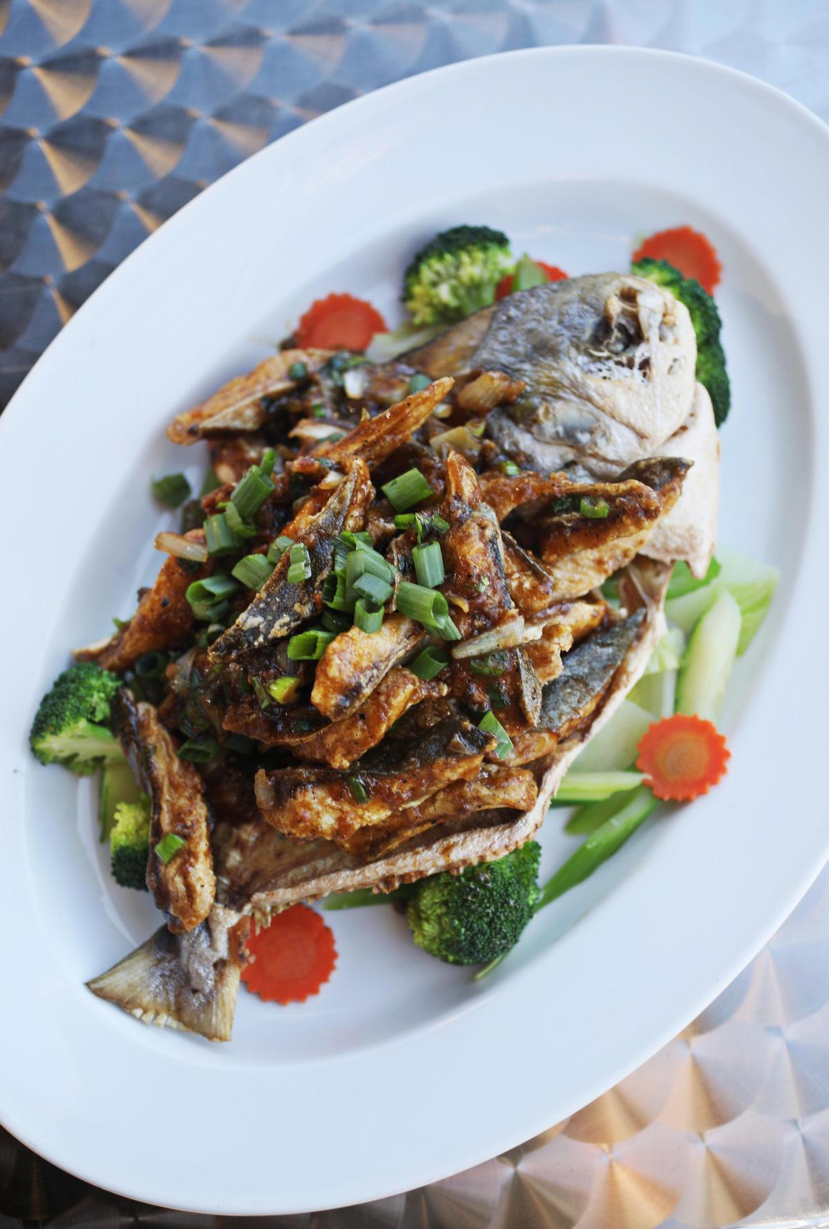 Thai 54’s garlic and pepper fish makes for an impressive presentation.