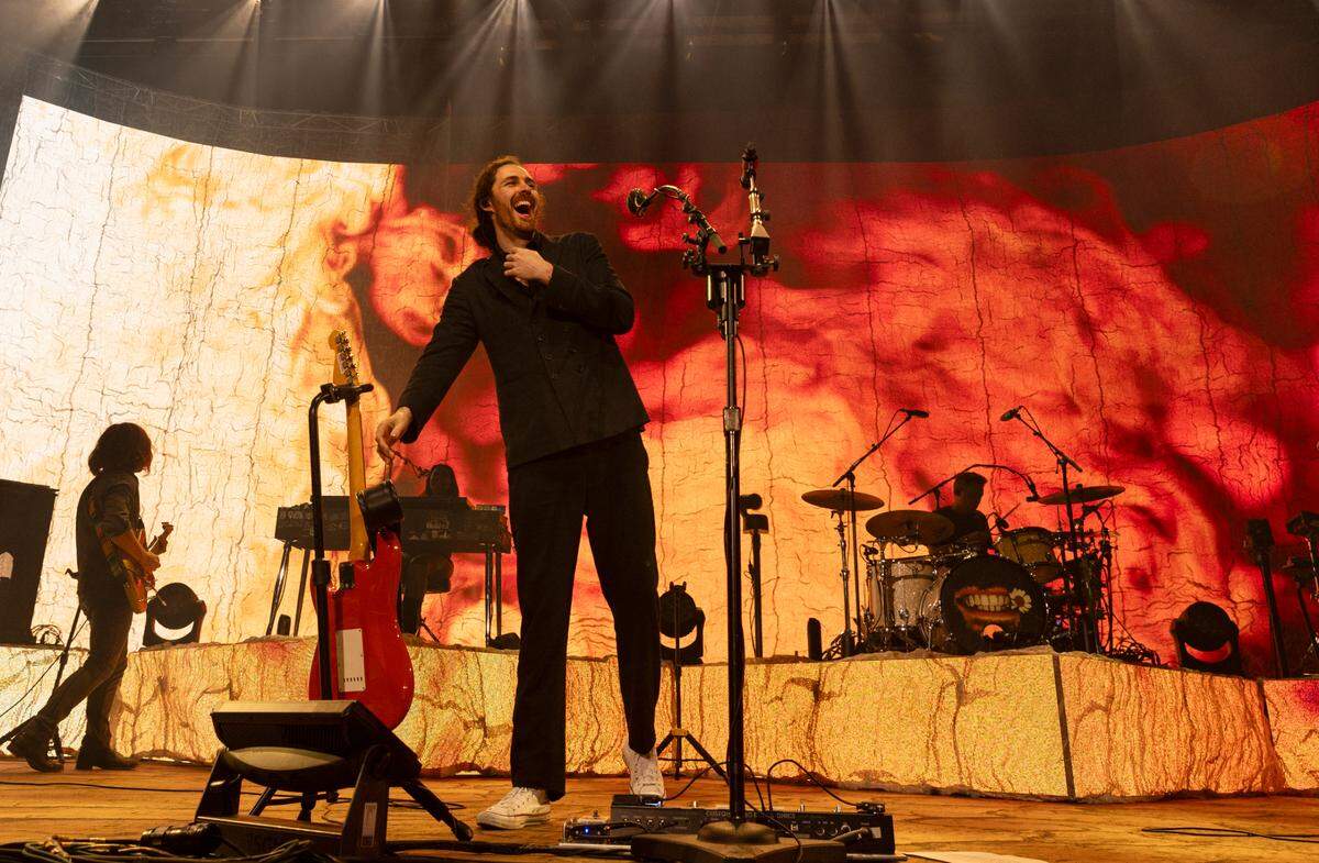 Hozier beams at the sold-out crowd at Coastal Credit Union Music Park at Walnut Creek in Raleigh, N.C., Saturday night, April 20, 2024.
