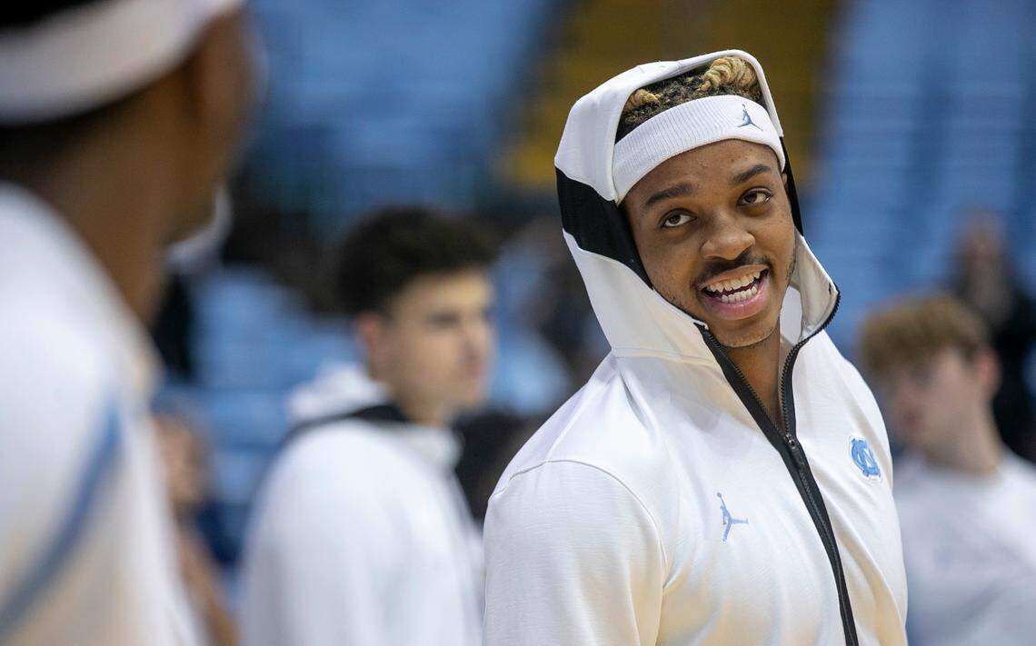 North Carolina’s Armando Bacot (5) talks with his teammates as they warm up for their game against James Madison on Sunday, November 20, 2022 at the Smith Center in Chapel Hill, N.C.