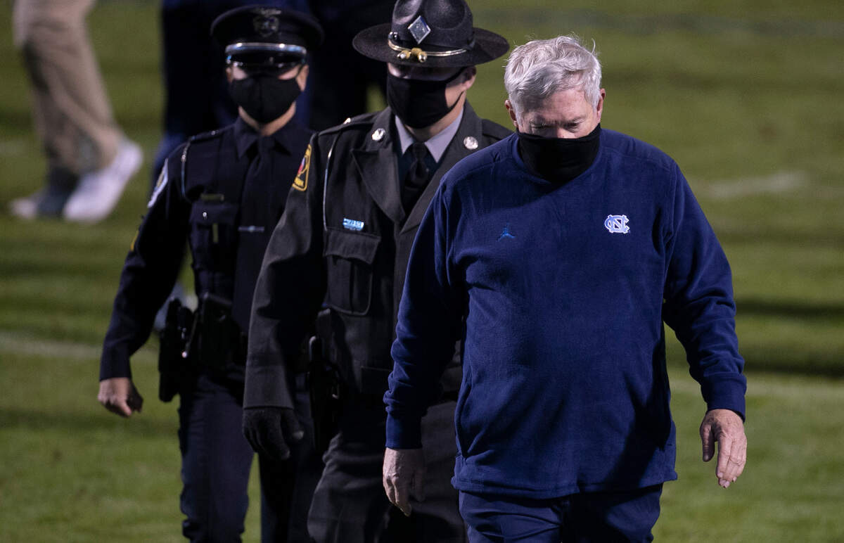 North Carolina coach Mack Brown leaves the field following the Tar Heels’ 44-41 loss to Virginia on Saturday, October 31, 2020 at Scott Stadium in Charlottesville, Va.