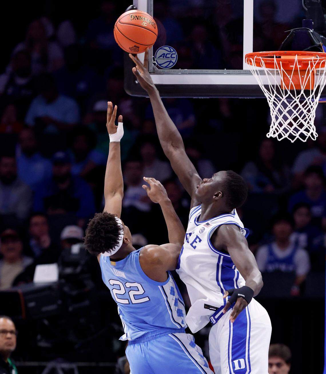 Duke’s Khaman Maluach (9) blocks the shot by North Carolina’s Ven-Allen Lubin (22) during the second half of Duke’s 74-71 victory over UNC in the semifinals of the 2025 ACC Men’s Basketball Tournament at the Spectrum Center in Charlotte, N.C., Friday, March 14, 2025.