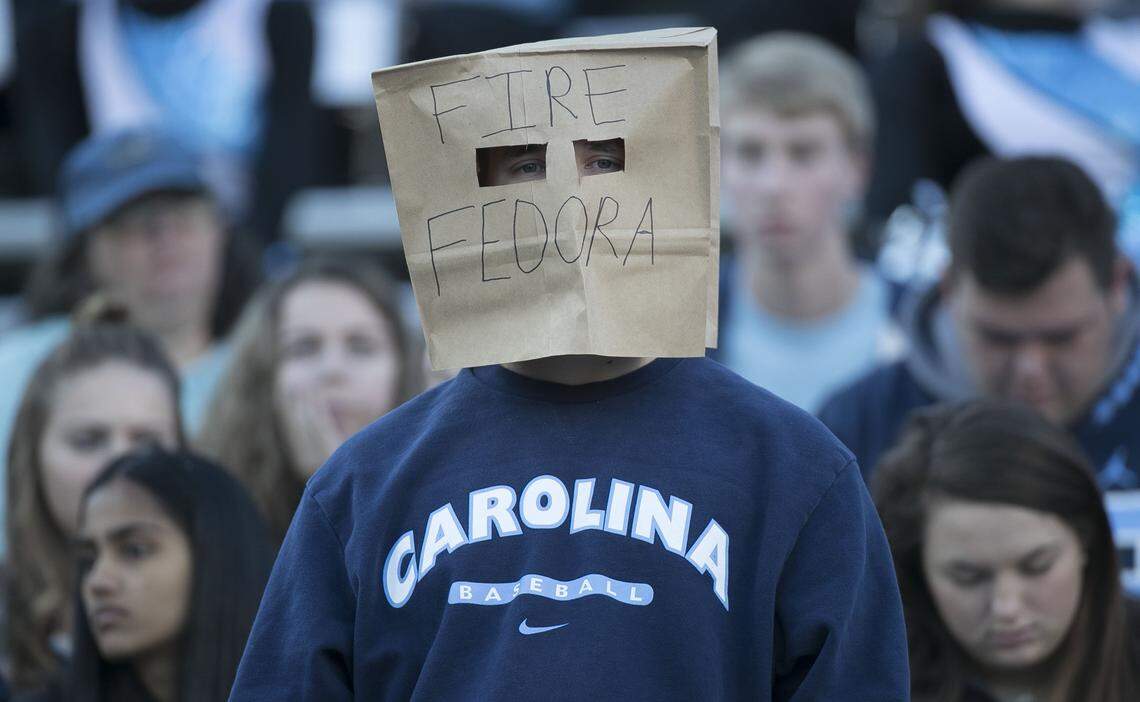A North Carolina student, who wished to remain anonymous, covered his head with a paper bags to show his displeasure with football coach Larry Fedora, calling for him to be fired, during the Tar Heels’ game against Western Carolina on Saturday, November 17, 2018 at Kenan Stadium in Chapel Hill.