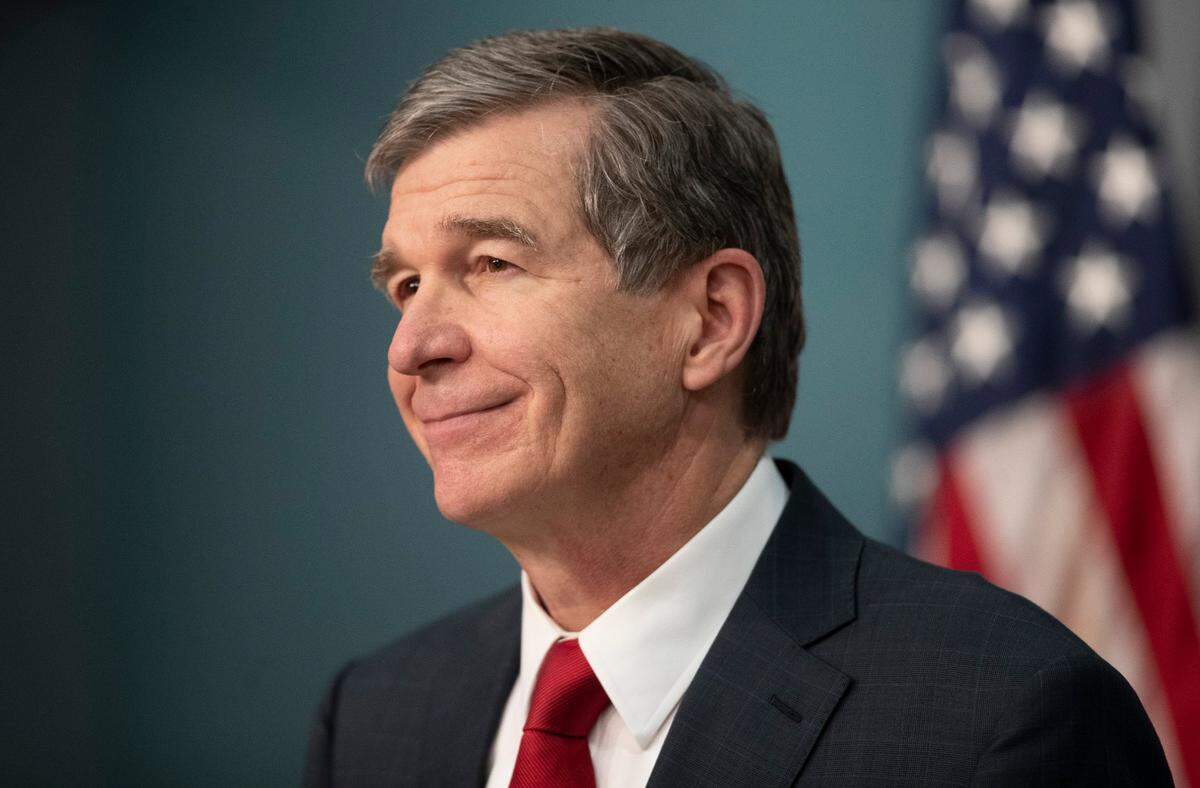 North Carolina Governor Roy Cooper takes questions during a press briefing on the COVID-19 virus and vaccine efforts on Wednesday, December 30, 2020 at the Emergency Operations Center in Raleigh, N.C.