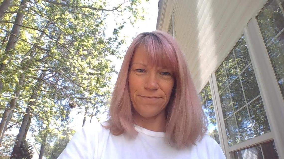 Nichole Case, a seventh-grade science teacher at Pine Hollow Middle School, dyed her hair pink to surprised her students as they start online classes during the coronavirus pandemic.