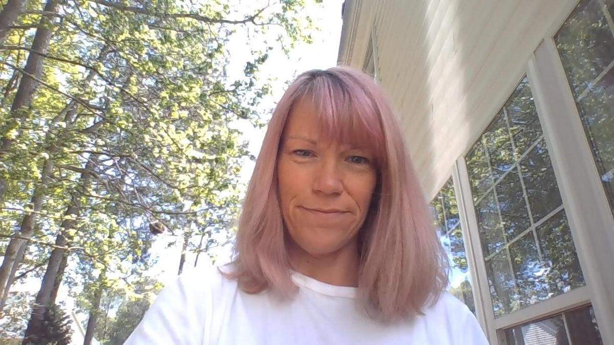 Nichole Case, a seventh-grade science teacher at Pine Hollow Middle School, dyed her hair pink to surprised her students as they start online classes during the coronavirus pandemic.
