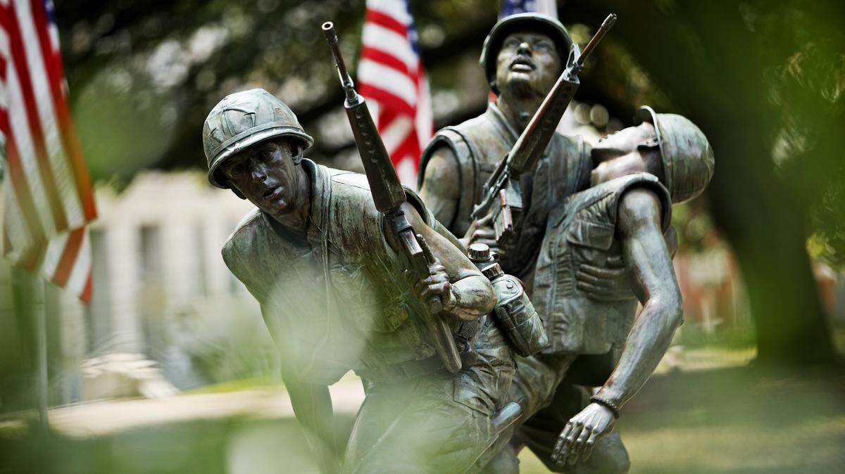 Located on the state Capitol grounds in Raleigh, the North Carolina Vietnam Veterans Memorial honors the more than 206,000 N.C. men and women who served in the Vietnam War. It features three soldiers in a scene called “After the Firefight.” Two soldiers are carrying a third wounded soldier.