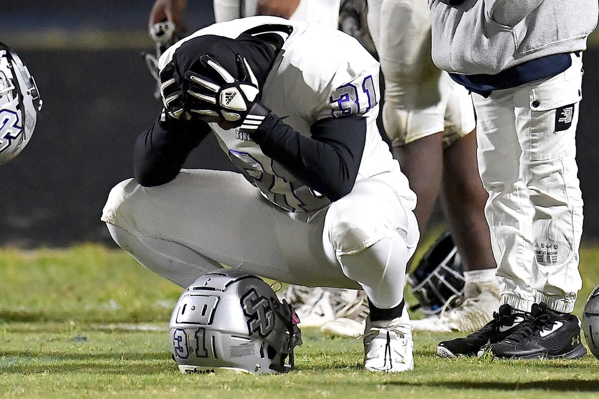 South Garner’s Tyler Clark (31) reacts to the loss to Willow Spring by the second missed field goal at the end of the fourth quarter. The Willow Spring Storm and the South Garner Titans met in a football game in Fuquay-Varina. N.C. on October 18, 2024.
