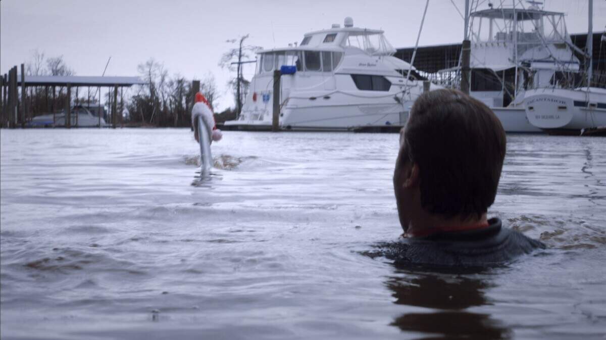 A shark torments a family at Christmas in the Syfy movie “Santa Jaws.”