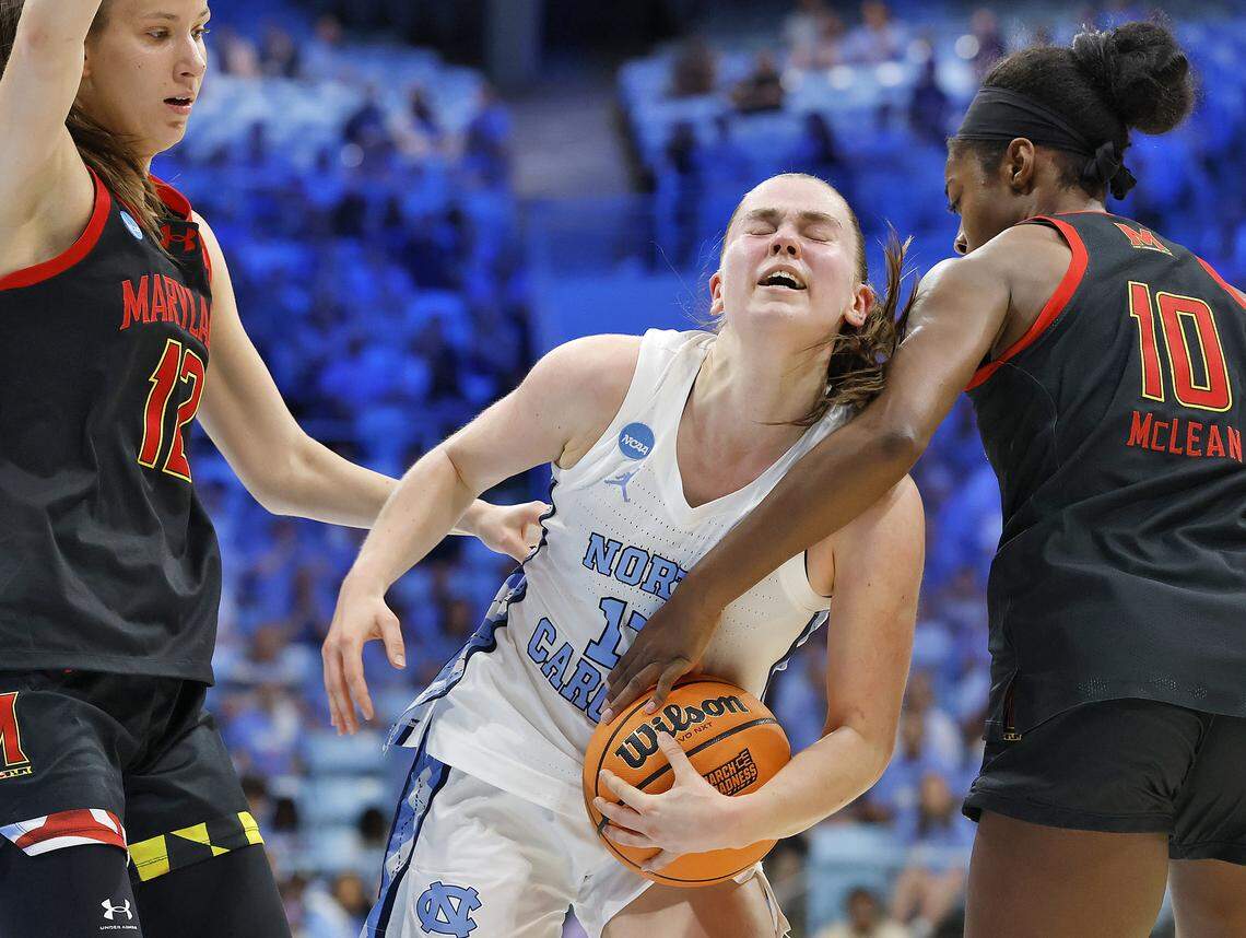 North Carolina’s Elina Aarnisalo drives between Maryland’s Yarden Garzon and Mir McLean during the first half of the Tar Heels’ second-round NCAA Tournament game on Sunday, March 22, 2026, at Carmichael Arena in Chapel Hill, N.C.
