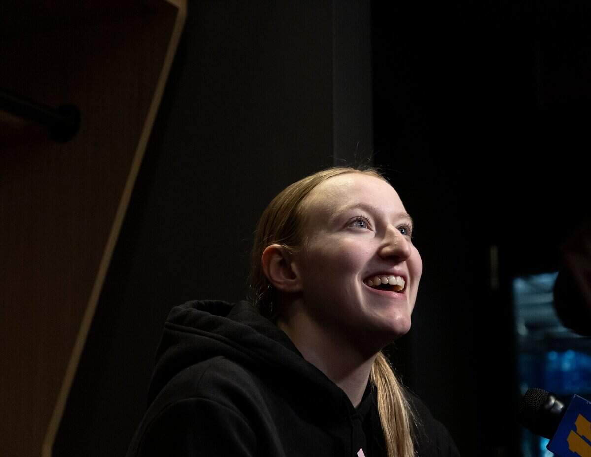 N.C. State’s Maddie Cox smiles while answering questions from media in the locker room at Rocket Mortgage FieldHouse on Thursday, April 4, 2024, in Cleveland, Ohio. The Wolfpack will face South Carolina in the Final Four on Friday.