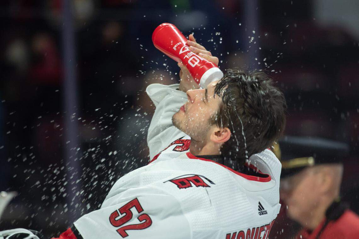 Dec 12, 2023; Ottawa, Ontario, CAN; Carolina Hurricanes goalie Pyotr Kochetkov (52) cools down prior to the start game against the Ottawa Senators at the Canadian Tire Centre. Mandatory Credit: Marc DesRosiers-USA TODAY Sports