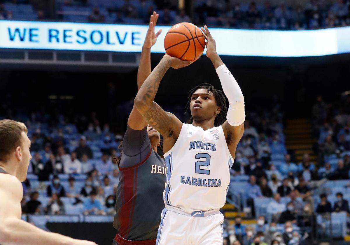 North Carolina’s Caleb Love (2) shoots during the first half of UNC’s game against Boston College at the Smith Center in Chapel Hill, N.C., Wednesday, Jan. 26, 2022.
