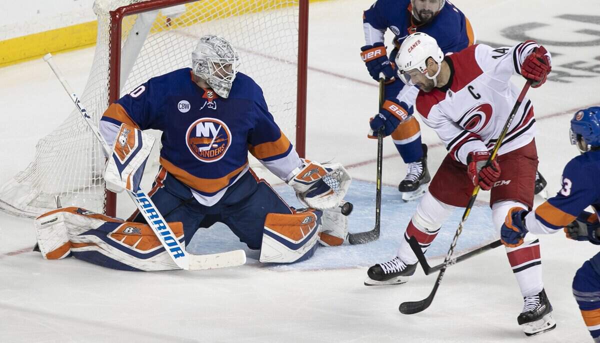 Carolina Hurricanes’ Justin Williams (14) tries to score on New York Islanders’ goalie Robin Lehner (40) in the third period during Game 1 of the second round Stanley Cup series on Friday, April 26, 2019 at Barclays Center in Brooklyn, N.Y.