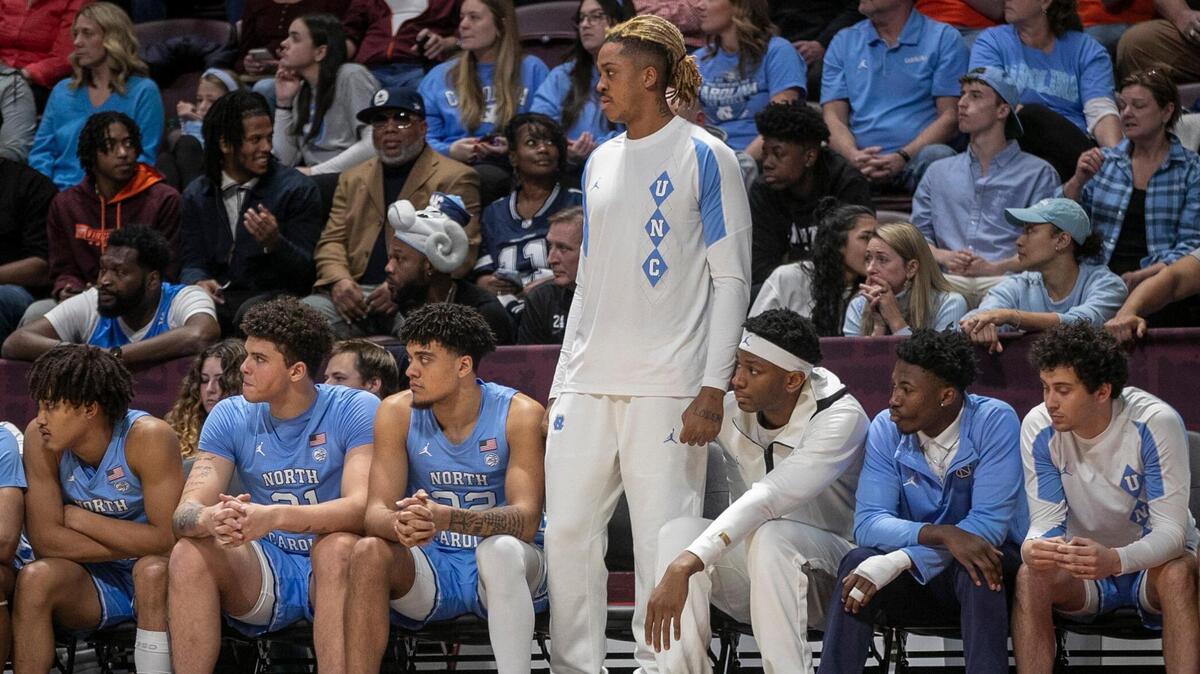 North Carolina’s Armando Bacot (5) watches the second half against Virginia Tech from the bench on Sunday, December 4, 2022 at Cassell Coliseum in Blacksburg, Va. Bacot did not play, due to an injury.