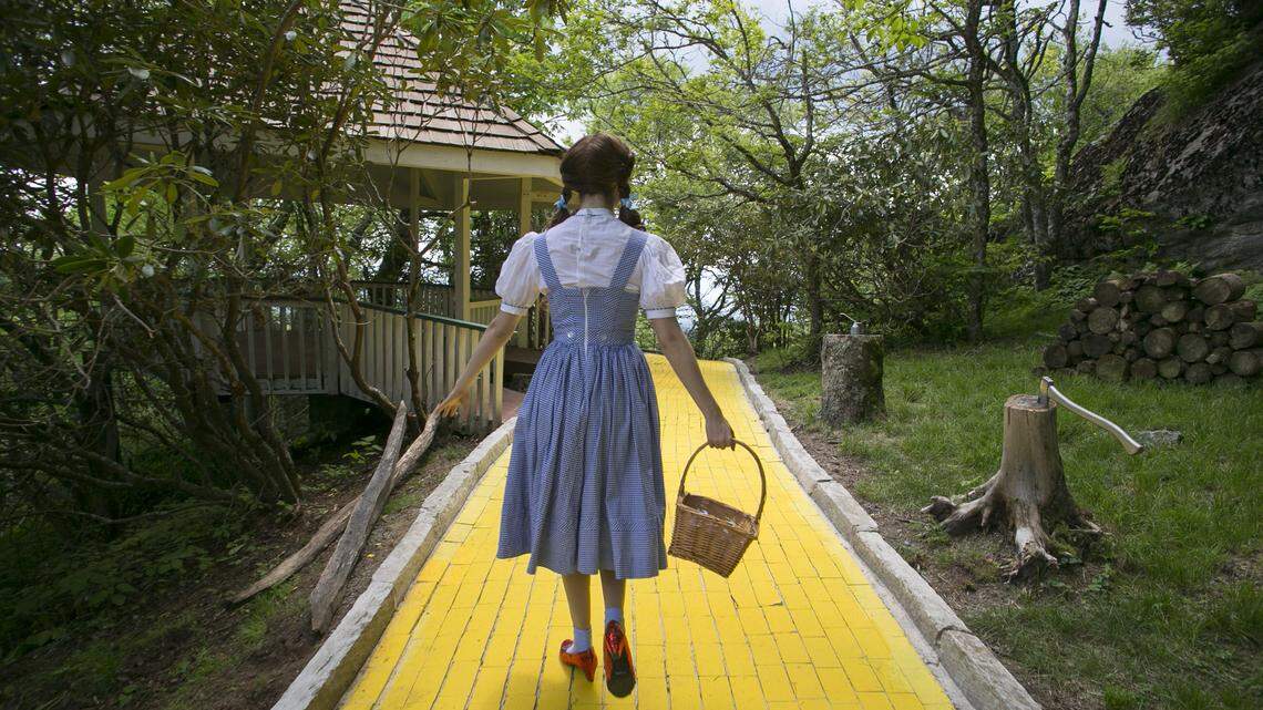 Dorothy takes visitors to the Land of Oz atop Beech Mountain for a tour of the yellow brick road during a “Journey with Dorothy” event in 2018.