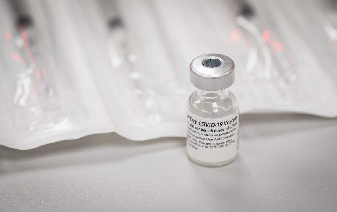 A vial of the COVID-19 vaccine sits on the counter in DJ’s Pharmacy in Cary, N.C. on Sept. 4, 2021.