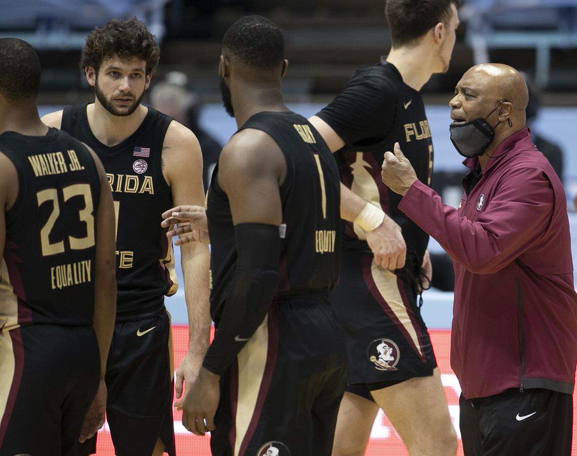 Florida State coach Leonard Hamilton talks with his team during the second half against North Carolina on Saturday, February 27, 2021 in Chapel Hill, N.C.