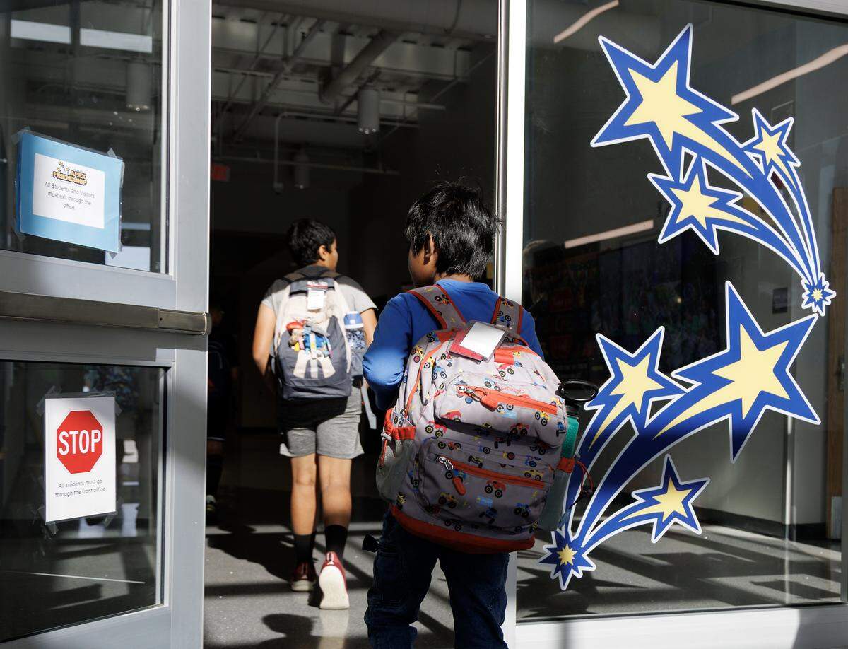 Students arrive at Apex Friendship Elementary School on Tuesday, May 5, 2026, in Apex, N.C.