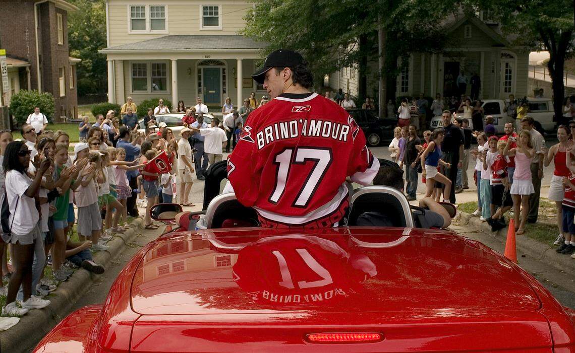 Then-Carolina Hurricanes captain Rod Brind’Amour rides in a red convertible at the victory parade for the Stanley Cup champions June 21, 2006.