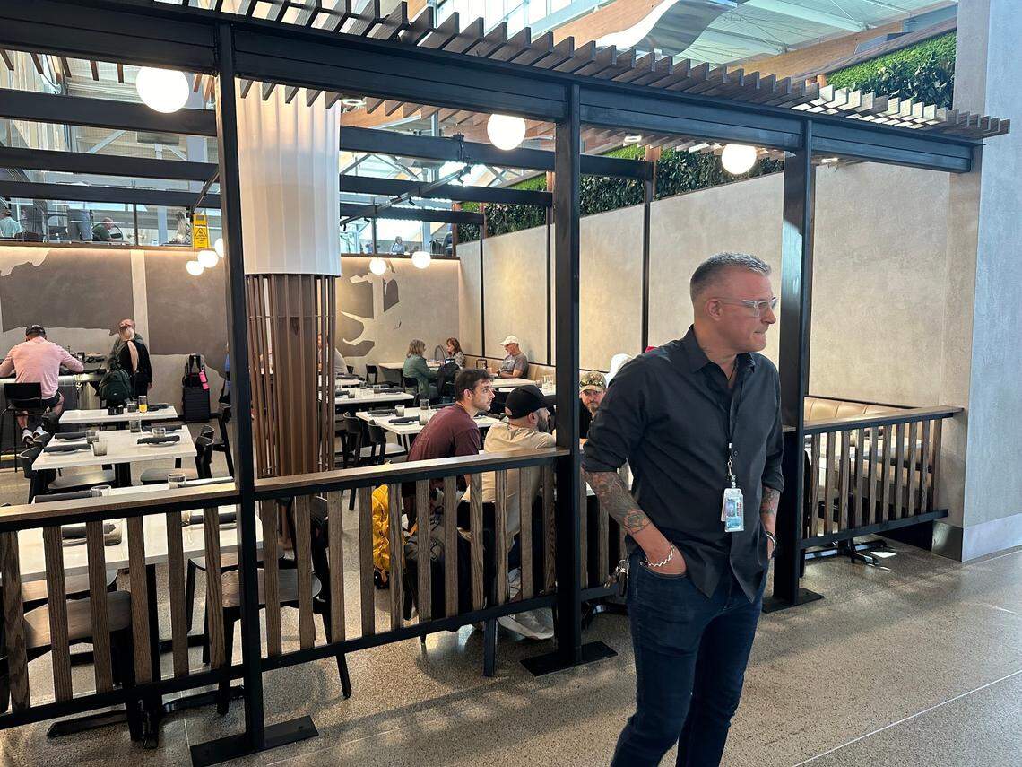 Scott Crawford in front of his new restaurant, Crawford’s Genuine, in Terminal 2 at Raleigh-Durham International Airport.